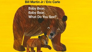 The cover of Baby bear, baby bear, what do you see featuring a mother bear and her cub against a yellow background.
