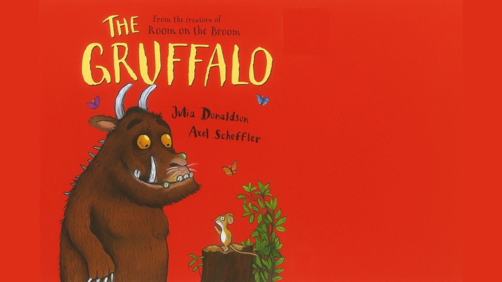 The cover of the Gruffalo showing the mythical beast next to a mouse on a red background.